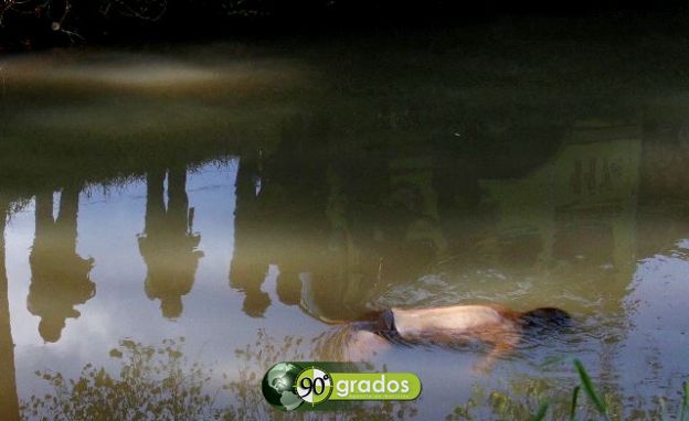 cuerpo flotando en el río Morelia